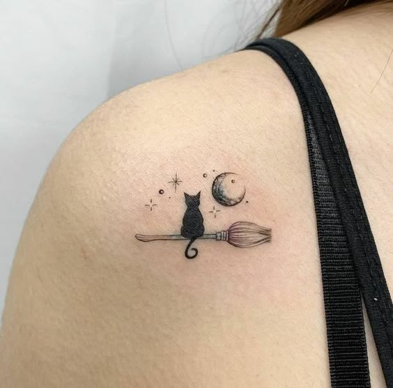 Vintage-style black cat tattoo design