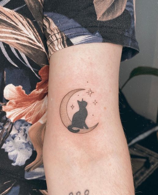 Cat tattoo design with crescent moon