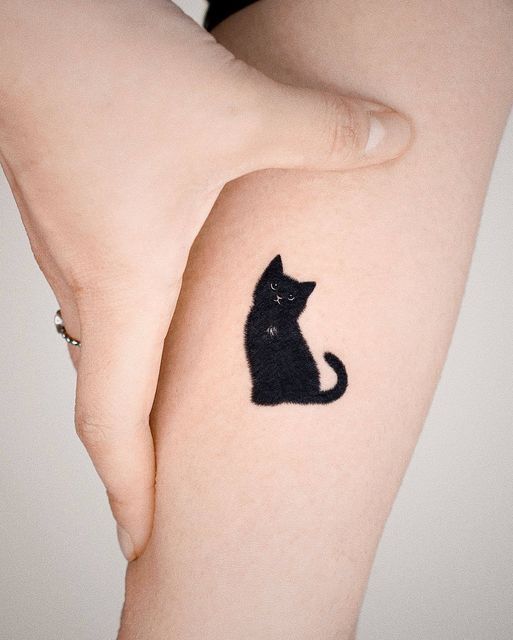 Collection of minimalist cat tattoo designs